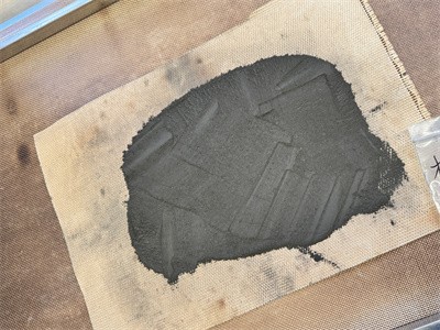 Drying of battery powder materials in microwave tunnel oven